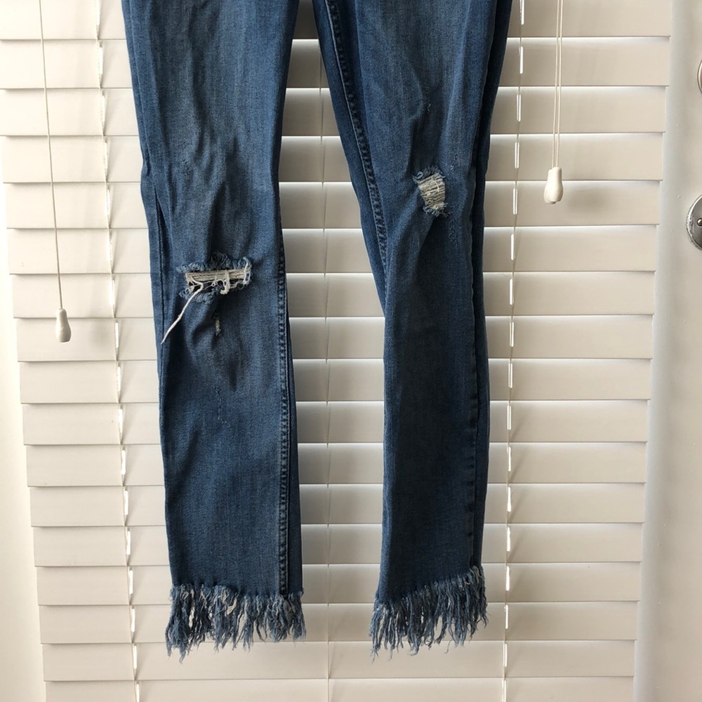 Free people distressed blue jeans